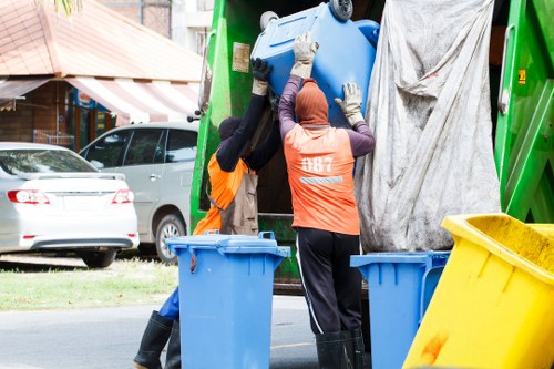 Charity pickup and reusable furniture being loaded for donation